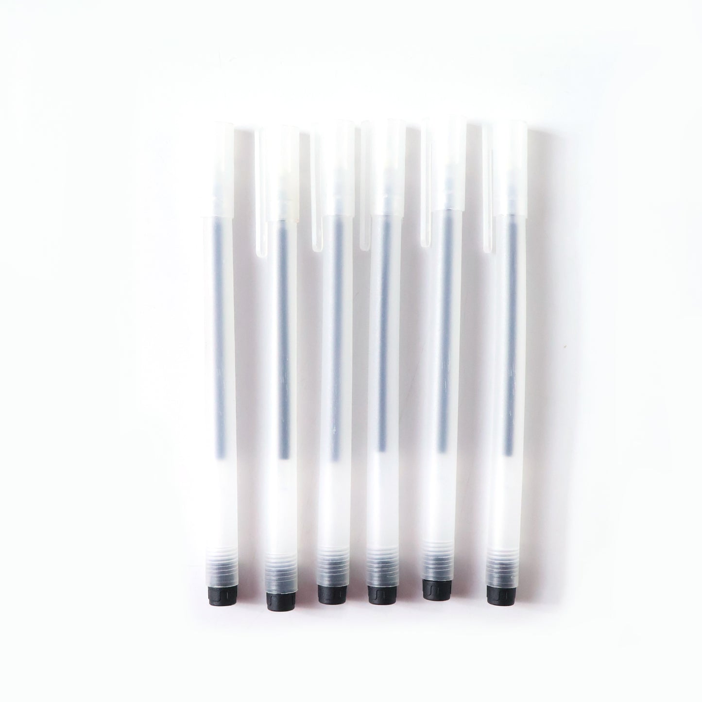 Set of six Wukusy transparent black gel pens with smooth writing tips, ideal for precise and comfortable writing.