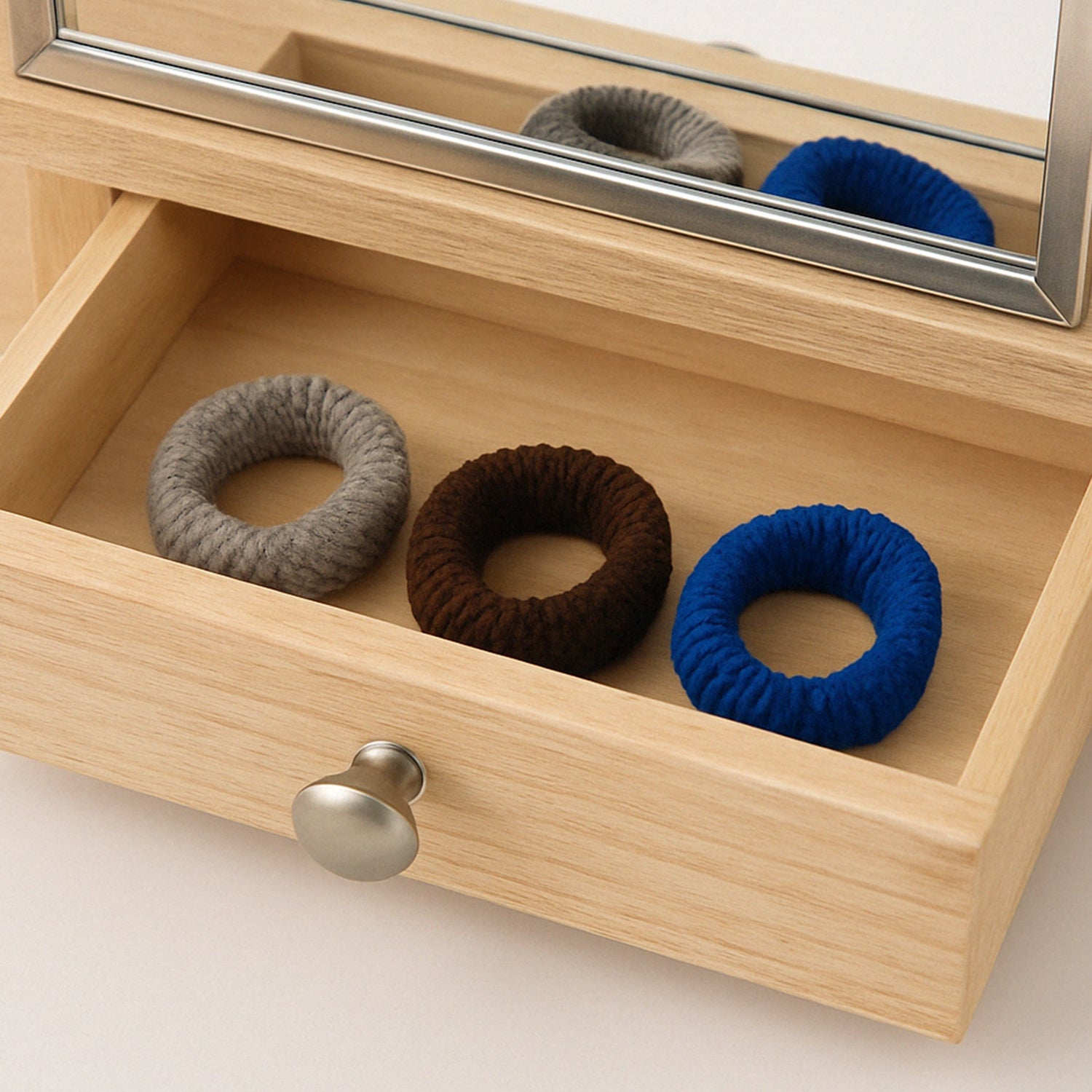 Pack of three multicolour tyre shape hair rubber bands by Wukusy, featuring vibrant, playful hair accessories for styling.
