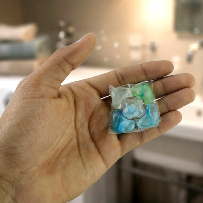 Wukusy Ultra Clean Liquid Laundry Detergent Pods in a 25-pack, showcasing the clear pods with liquid detergent inside.