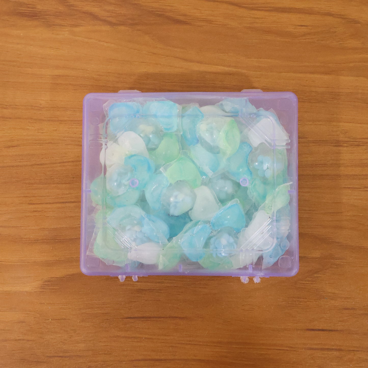 Wukusy Ultra Clean Liquid Laundry Detergent Pods, 25-piece pack, showing clear detergent pods with blue and white accents.