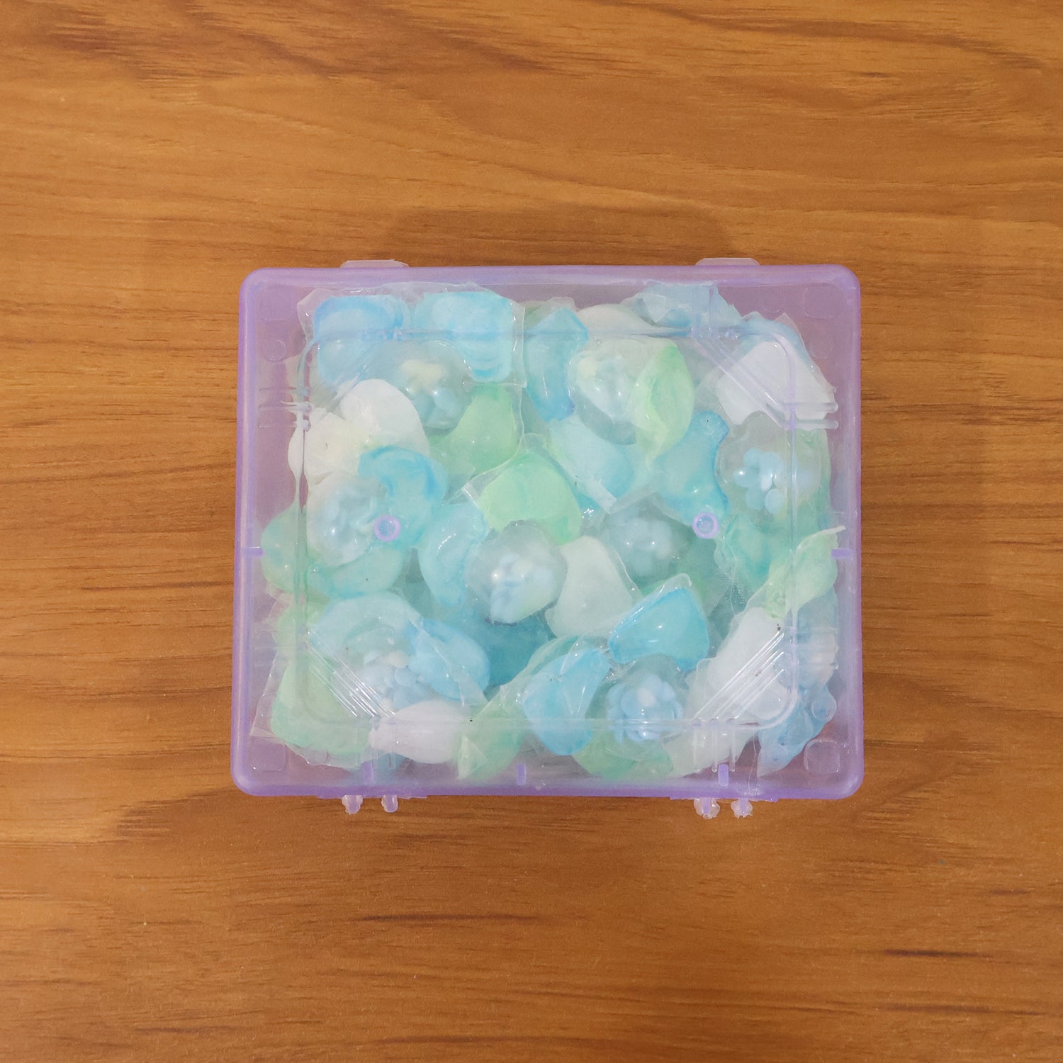 Wukusy Ultra Clean Liquid Laundry Detergent Pods, 25-piece pack, showing clear detergent pods with blue and white accents.