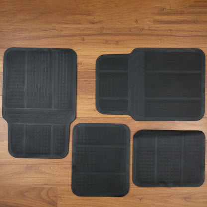Set of four Wukusy universal car floor mats showing textured rubber surface and edge trimming for vehicle interior protection.