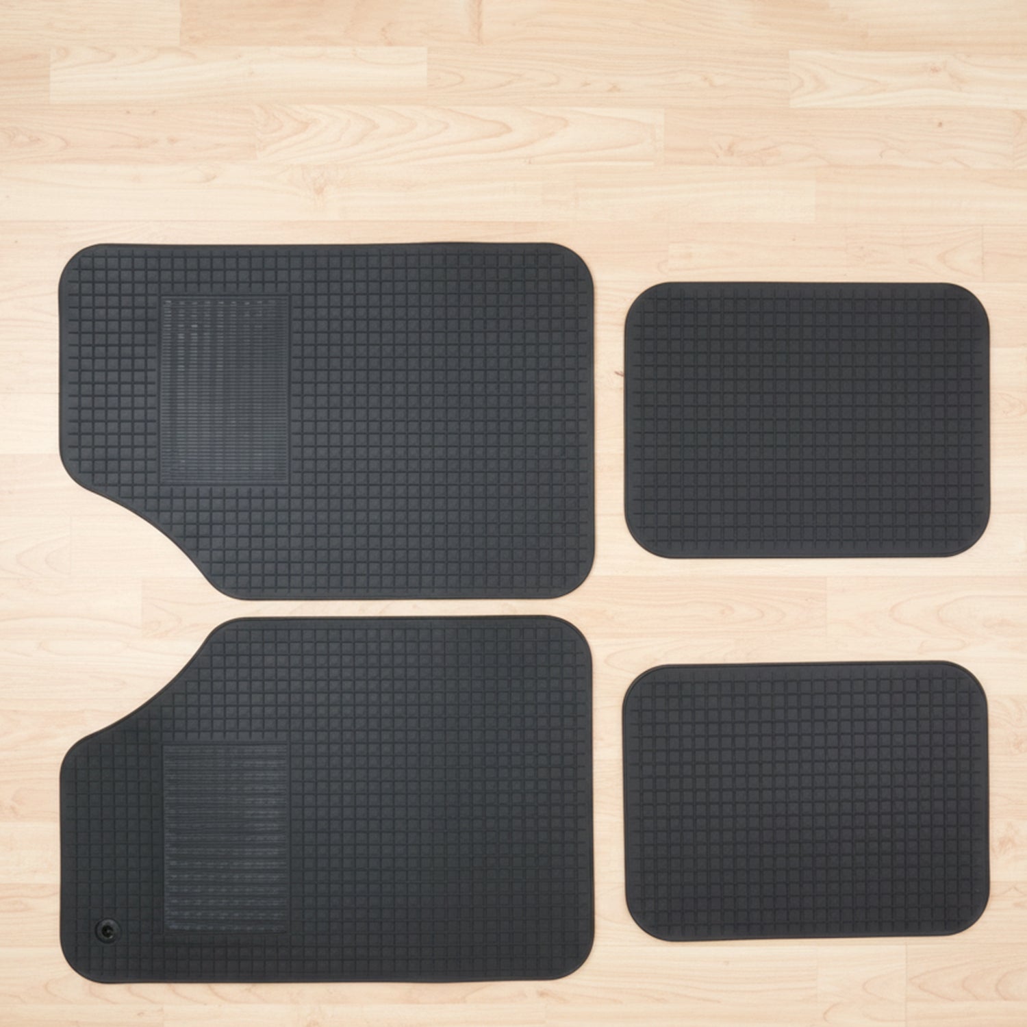 Set of four heavy-duty car floor mats by Wukusy, designed to protect vehicle floors from dirt and wear.