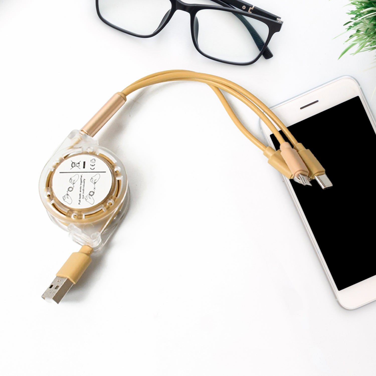 Wukusy 12835 retractable 3-in-1 Micro USB, Type C, and Android charging cable for mobile devices, shown extended with connectors visible.