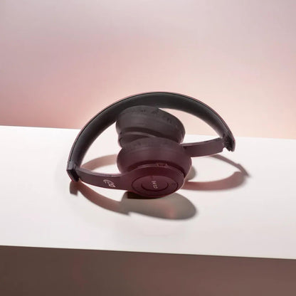 Wukusy wireless over-ear Bluetooth headphones with foldable headband, hands-free calling, black electronic headset.