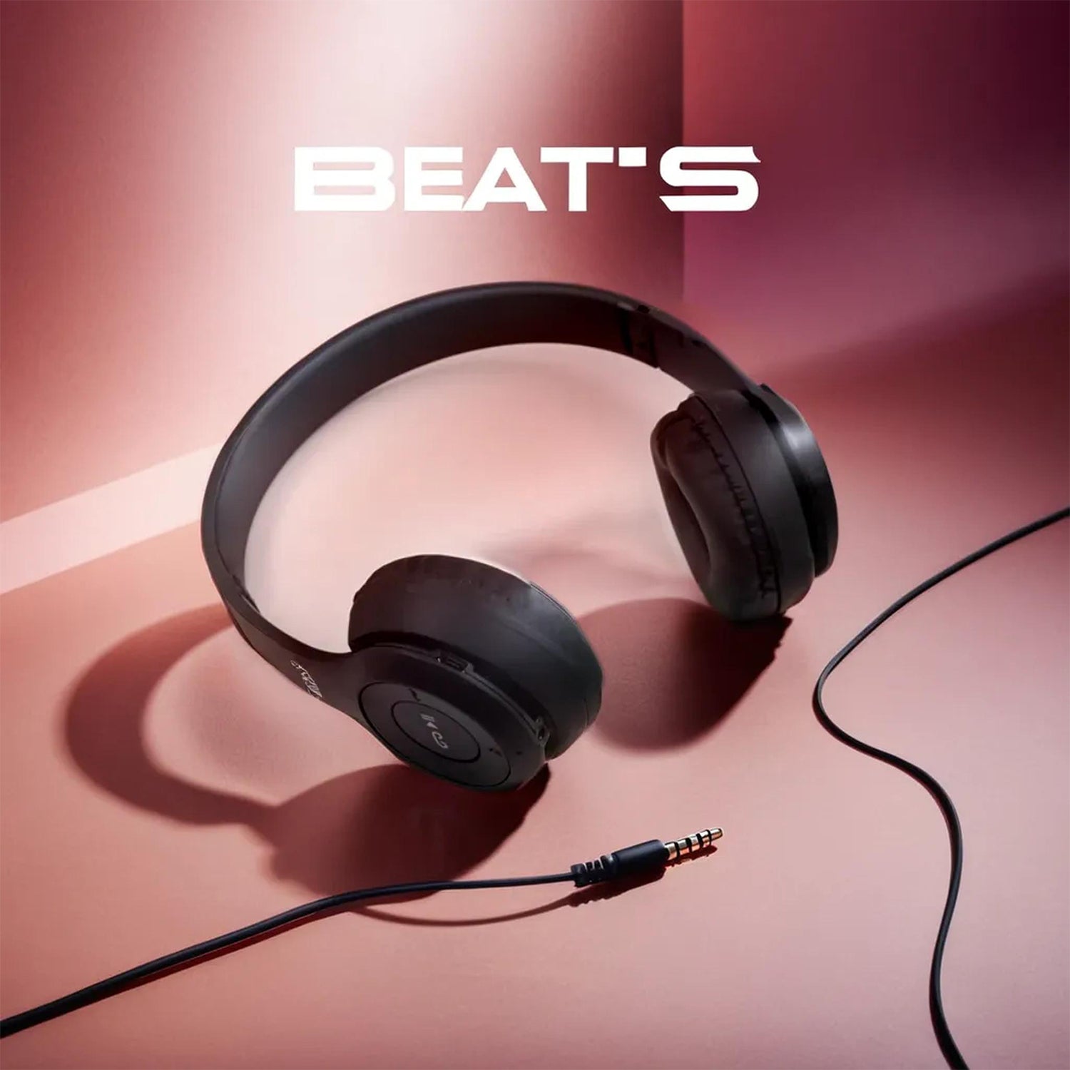 Wukusy wireless over-ear Bluetooth headphones with foldable headband, hands-free calling, and sleek black design.