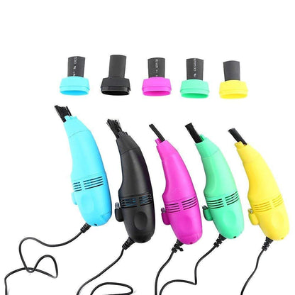 Wukusy 295 USB Mini Vacuum Cleaner for computers and cars, handheld electronic device for quick cleaning.