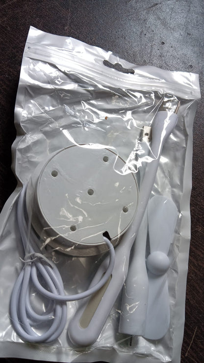 Wukusy portable mini USB fan with built-in USB light and 3-port USB hub, compact electronic device for cooling and connectivity.
