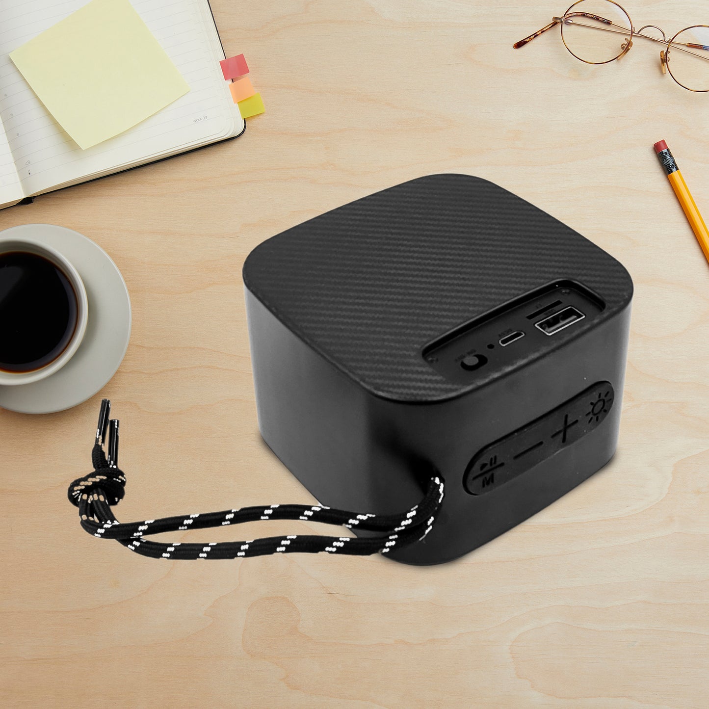 Wukusy portable mini wireless Bluetooth speaker in multicolor, compact electronic device for portable audio playback.