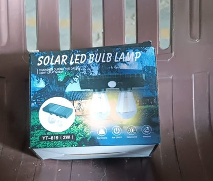 Wukusy Solar Double LED Bulb Lamp YT-819 2W, energy-efficient outdoor lighting with bright dual LEDs in a compact design.