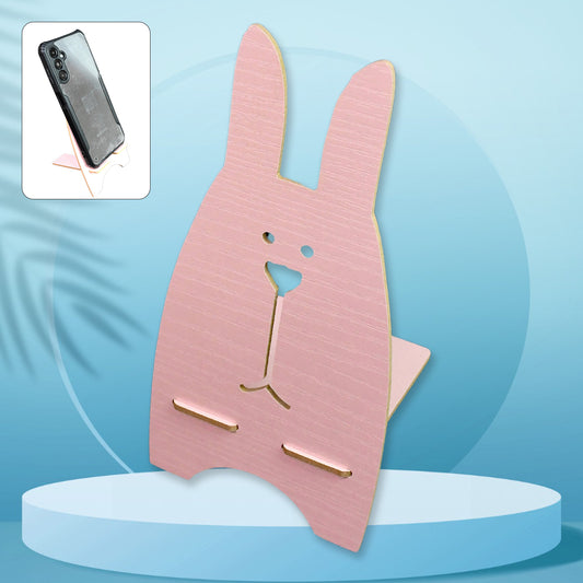 Wooden rabbit design mobile stand by Wukusy, cute and functional, perfect for holding smartphones in a stylish way.