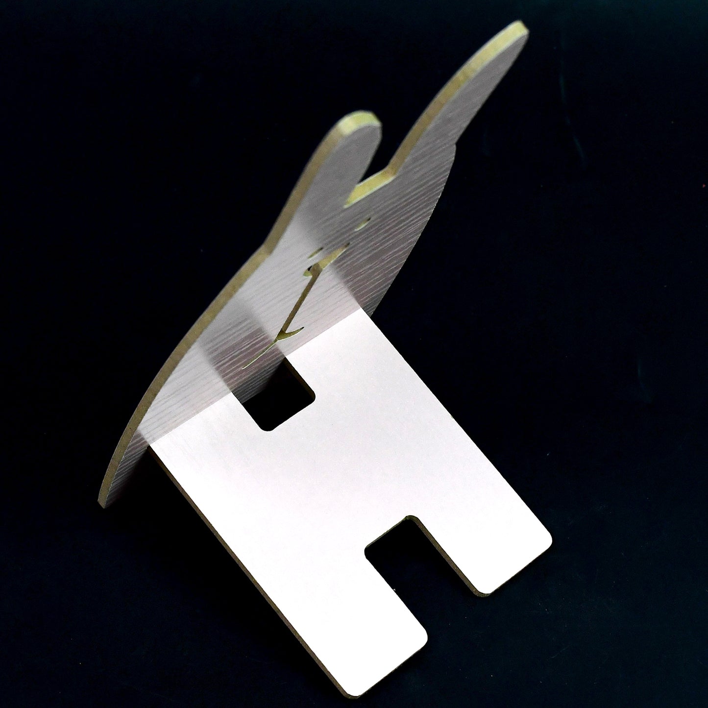 Wooden cute rabbit design mobile stand by Wukusy, perfect for holding smartphones with charming animal detail.