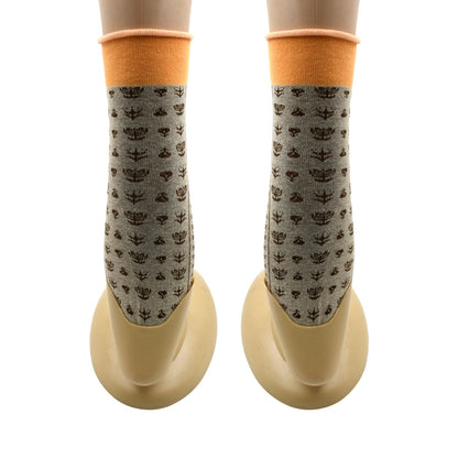 Wukusy 7356 breathable, thickened cotton socks featuring a classic simple design and soft, skin-friendly material for comfortable wear.