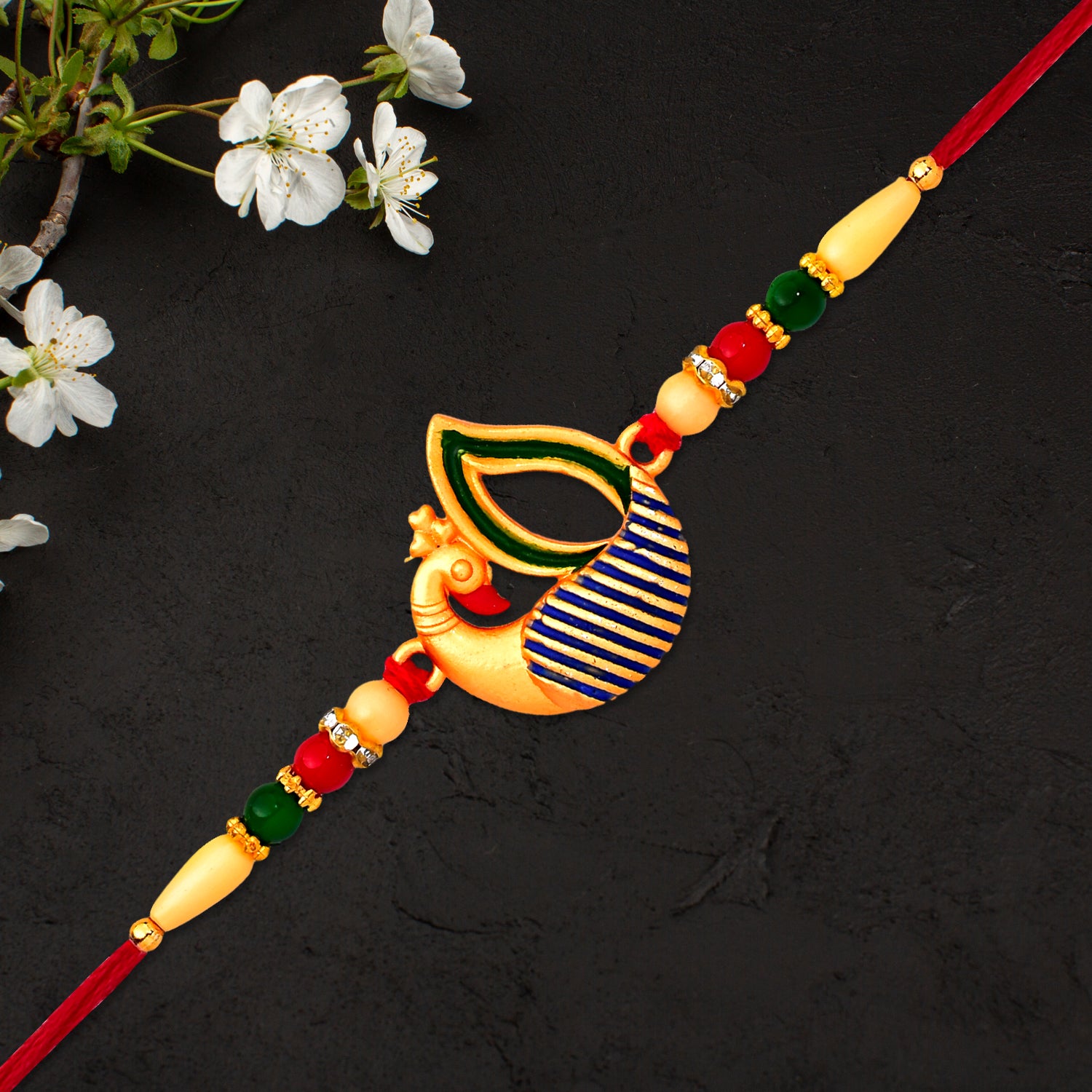 Beautiful peacock feather rakhi from Wukusy featuring intricate designs and vibrant colors, perfect for festive occasions.