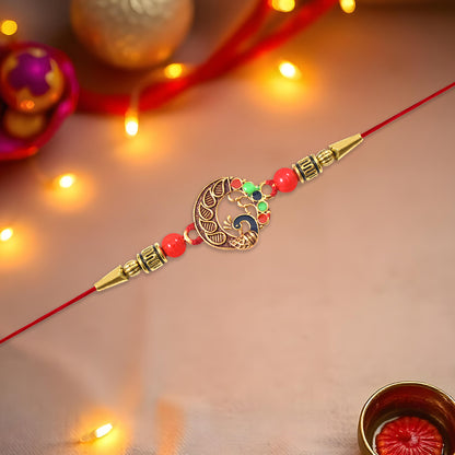 Elegant round Rakhi with peacock design from Wukusy, featuring intricate patterns and vibrant colors for festive occasions.
