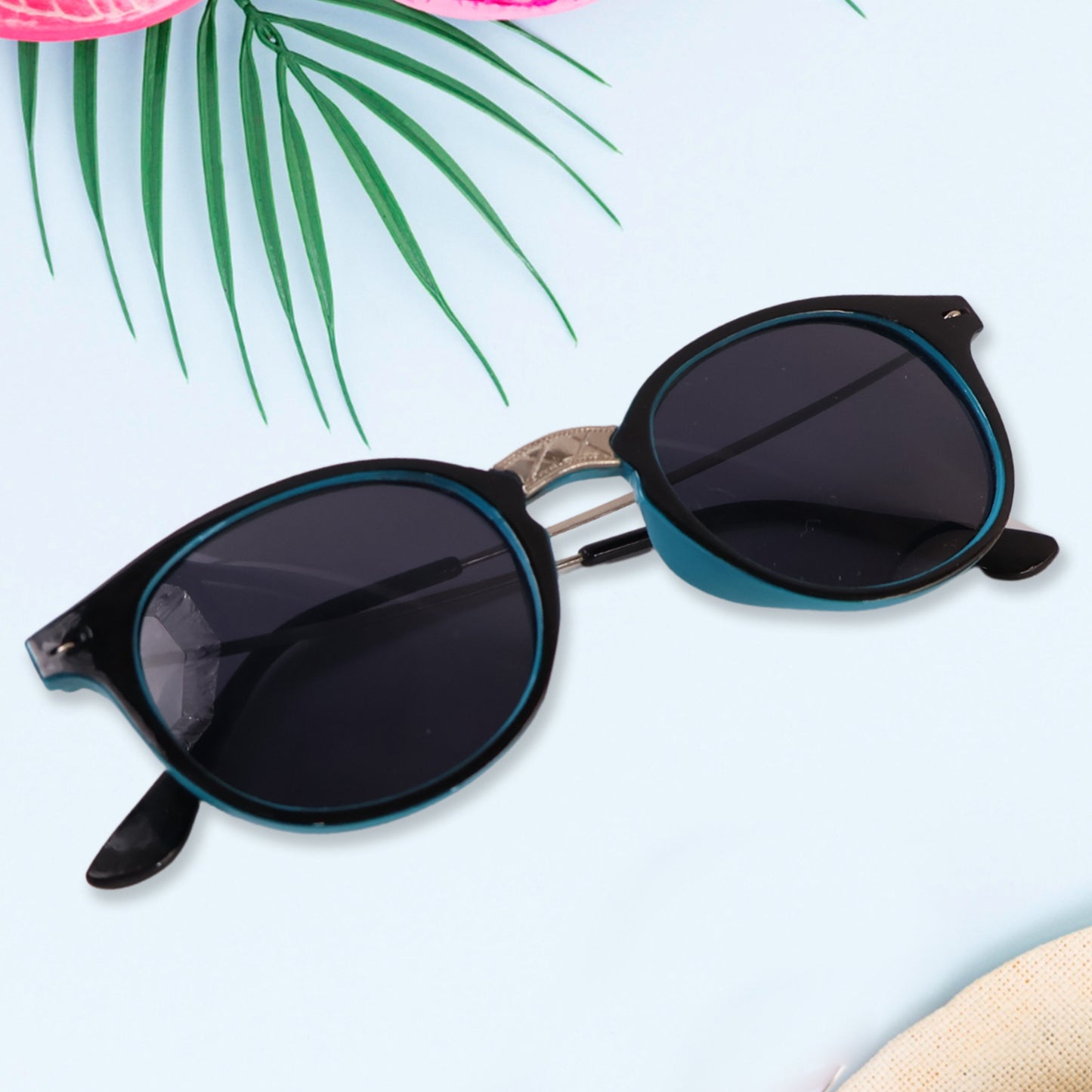 Sky blue UV-protected round sunglasses by Wukusy, lightweight fashion eyewear for men and women, classic and stylish design.