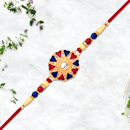 Elegant traditional designer Rakhi from Wukusy featuring intricate thread work and vibrant colors for festive celebrations.
