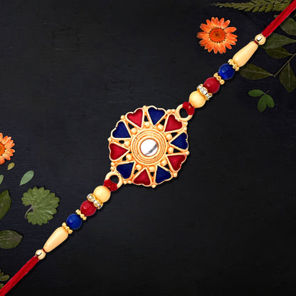 Traditional designer Rakhi from Wukusy in vibrant colors, featuring intricate patterns and elegant craftsmanship.