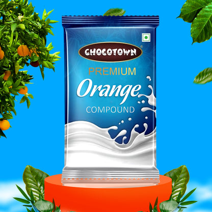 Wukusy Chocotown Premium Orange Compound 500g, vibrant orange-colored food ingredient for baking and confectionery.