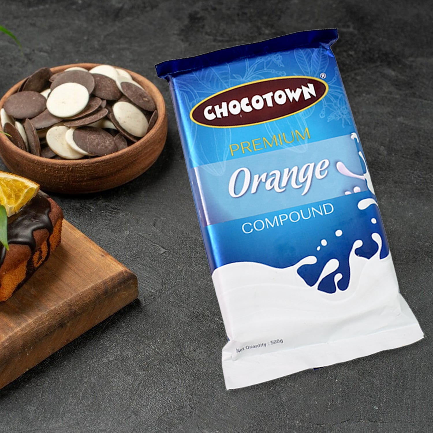 Wukusy Chocotown Premium Orange Compound 500g, a smooth orange-flavored chocolate spread in a jar.