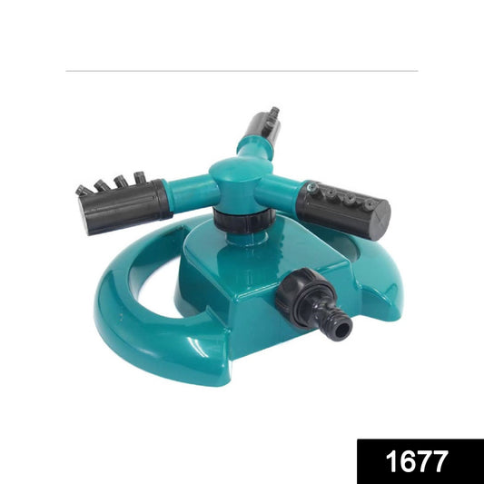 Wukusy 1677 3-arm 360-degree rotating water sprinkler for garden irrigation, attached to garden hose in yard setting.