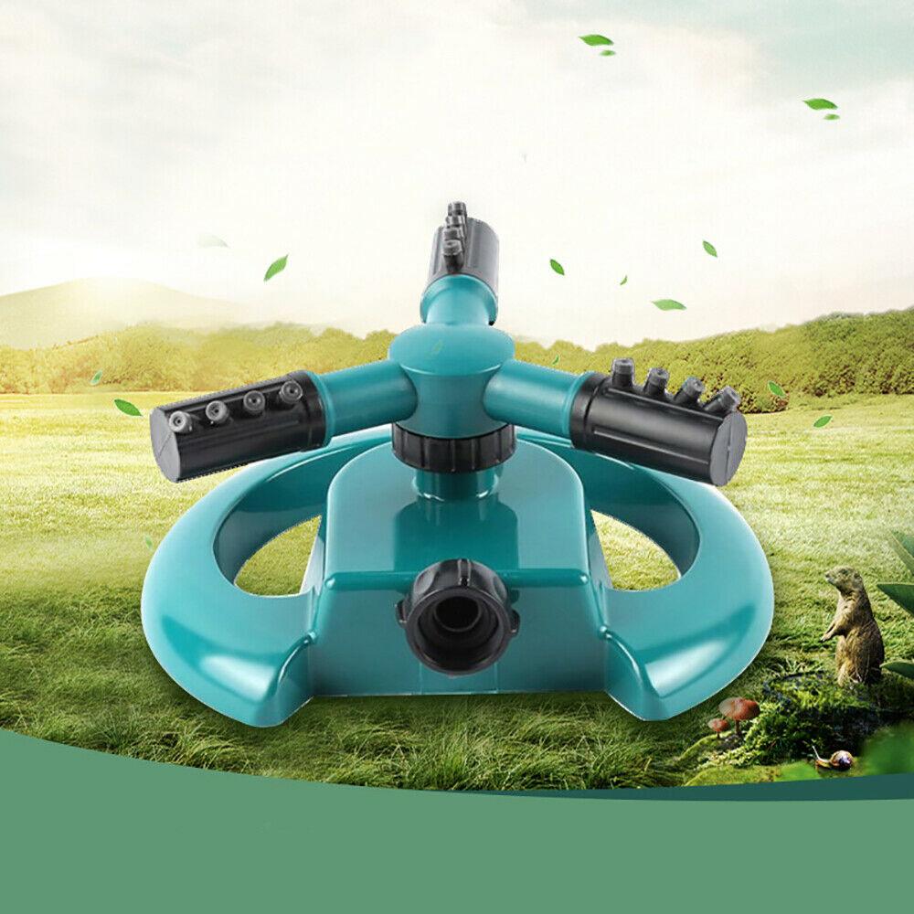 Wukusy 3-arm 360-degree rotating water sprinkler for garden irrigation, attached to garden hose in yard setting