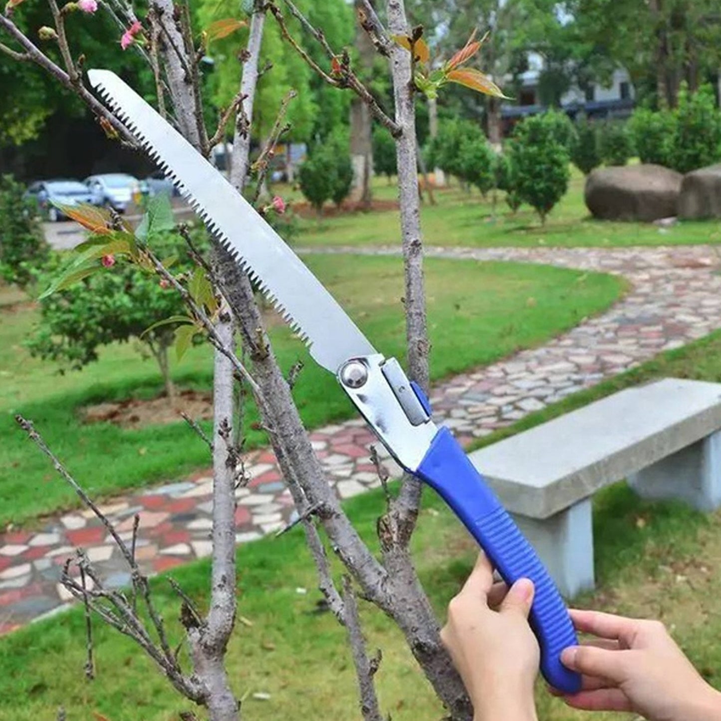 Wukusy 1729 folding woodworking and gardening saw with a wooden handle, suitable for outdoor logging and multi-purpose cutting.