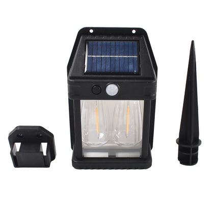 Wukusy 18W solar wall garden light with dual modes and motion sensor, mounted on a wall, illuminating outdoor space at night