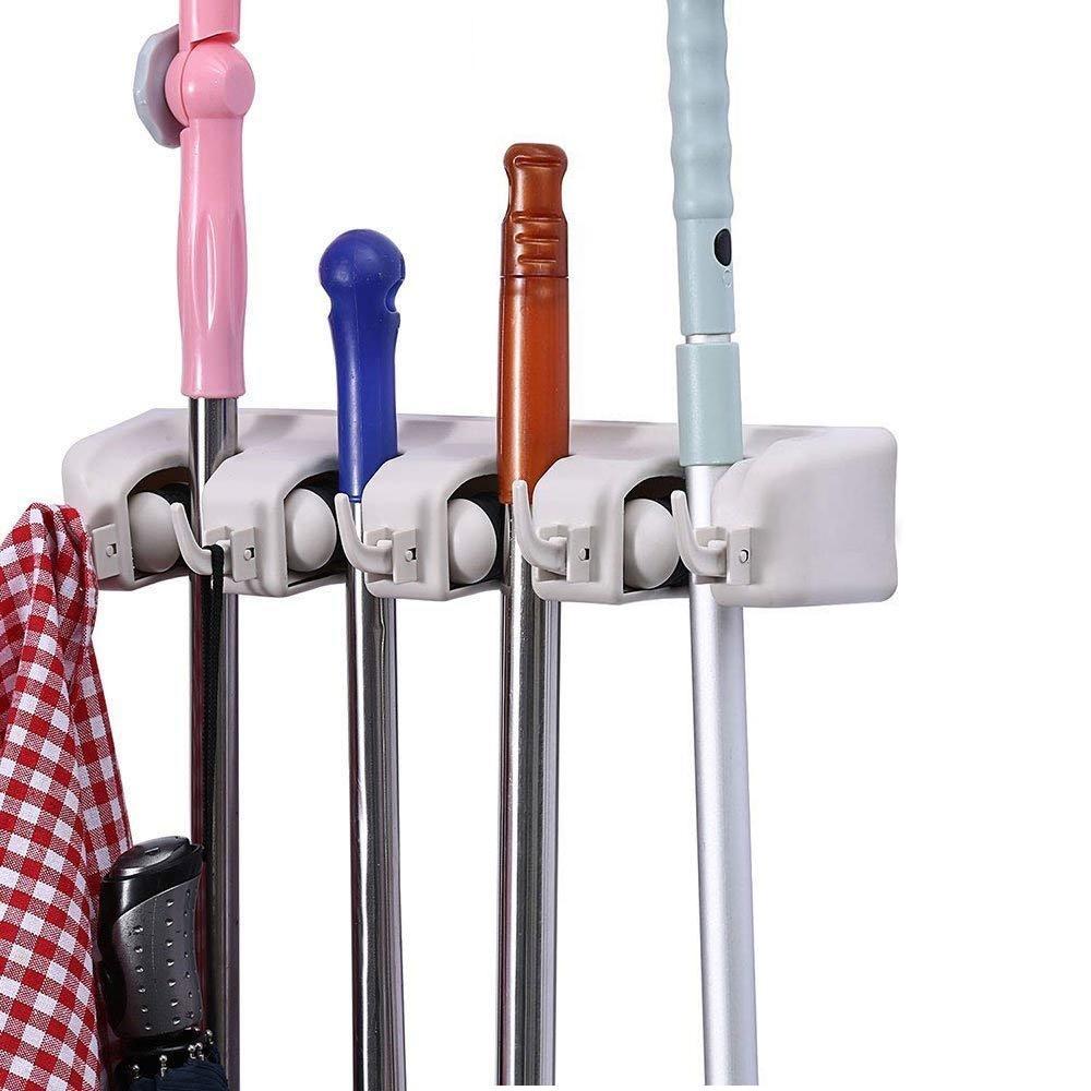 Wukusy 4-layer garden mop and broom holder, wall-mounted garden tool organizer with multiple slots for organized storage.