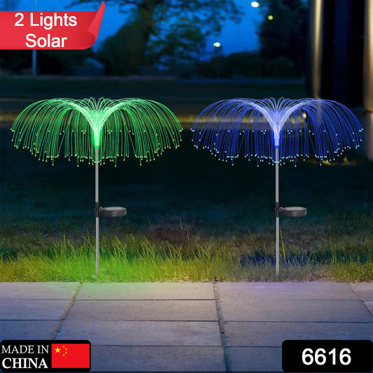 Wukusy 2-pack garden solar outdoor lights with 7-color changing RGB, waterproof flower jellyfish and firework decor for yard and patio.