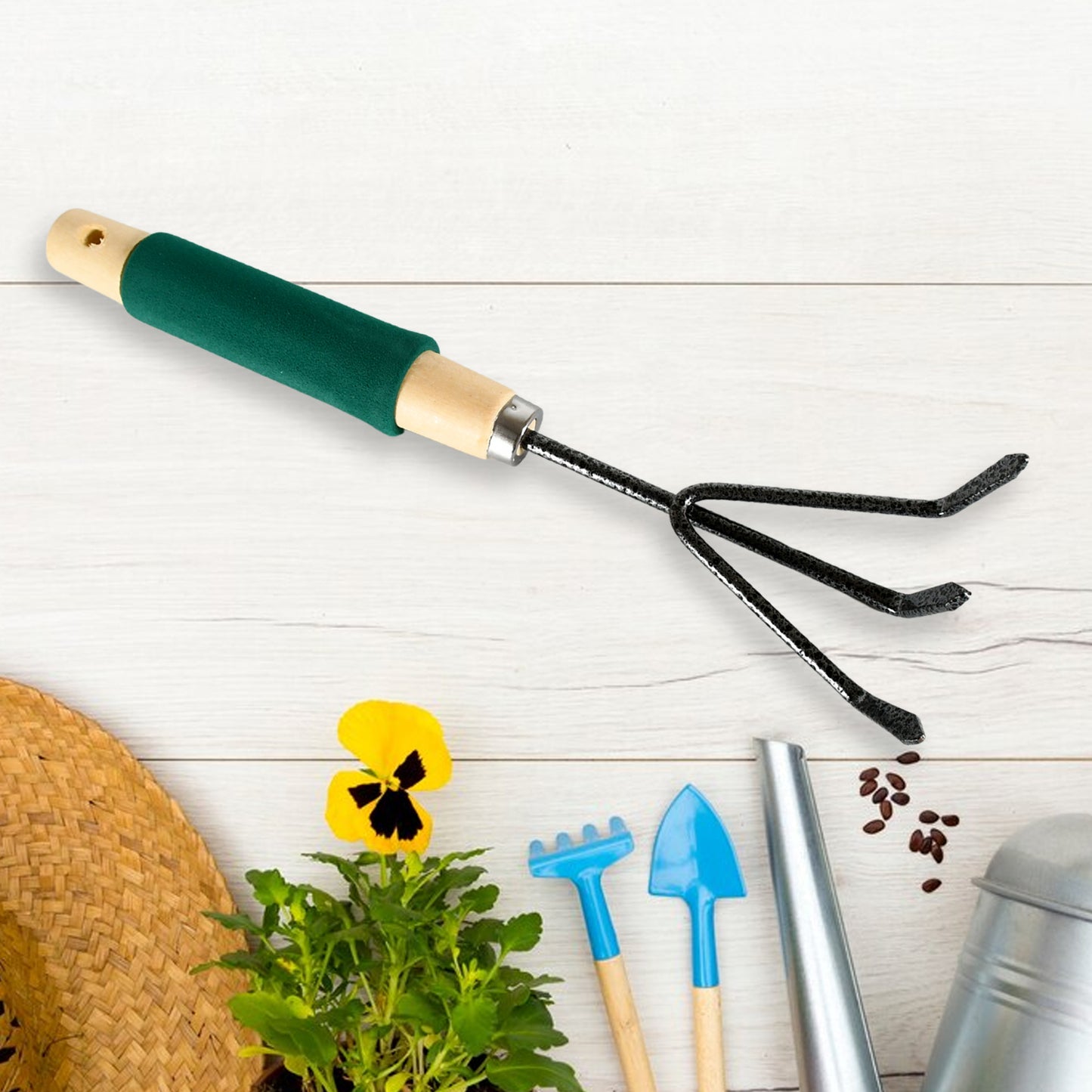 Set of three Wukusy gardening tools including hand cultivator and trowel with ergonomic wooden handles for transplanting and digging.