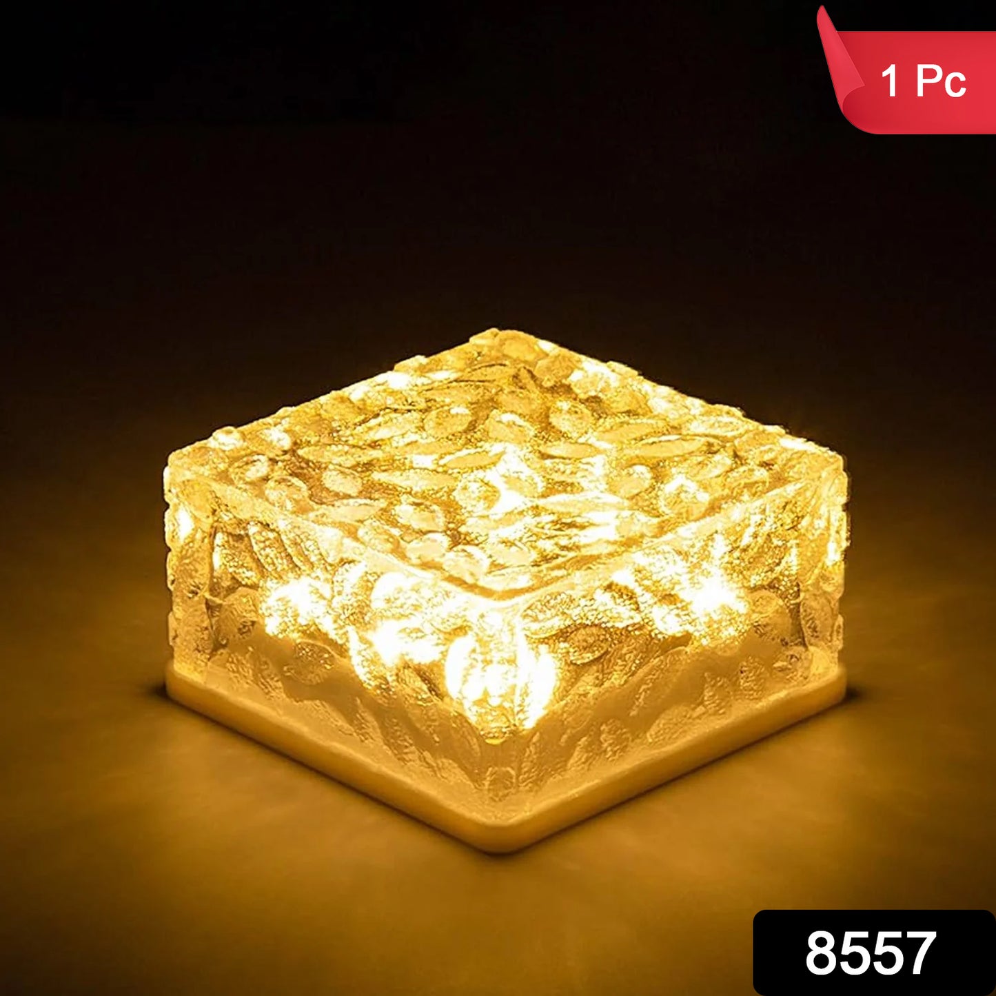 Wukusy ice cube-shaped solar garden light emitting warm glow, ideal for walkways, pathways, backyard, and holiday outdoor decor.