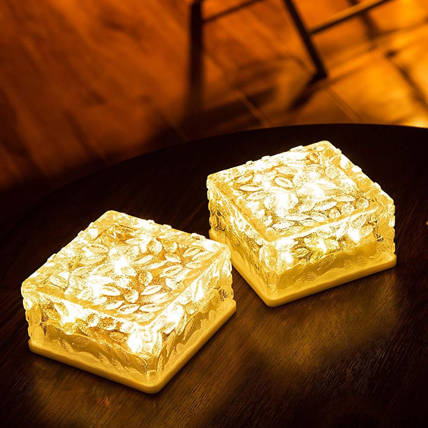 Wukusy ice cube-shaped solar garden light emits warm glow, ideal for walkways, pathways, backyard, and outdoor Christmas or party decor.