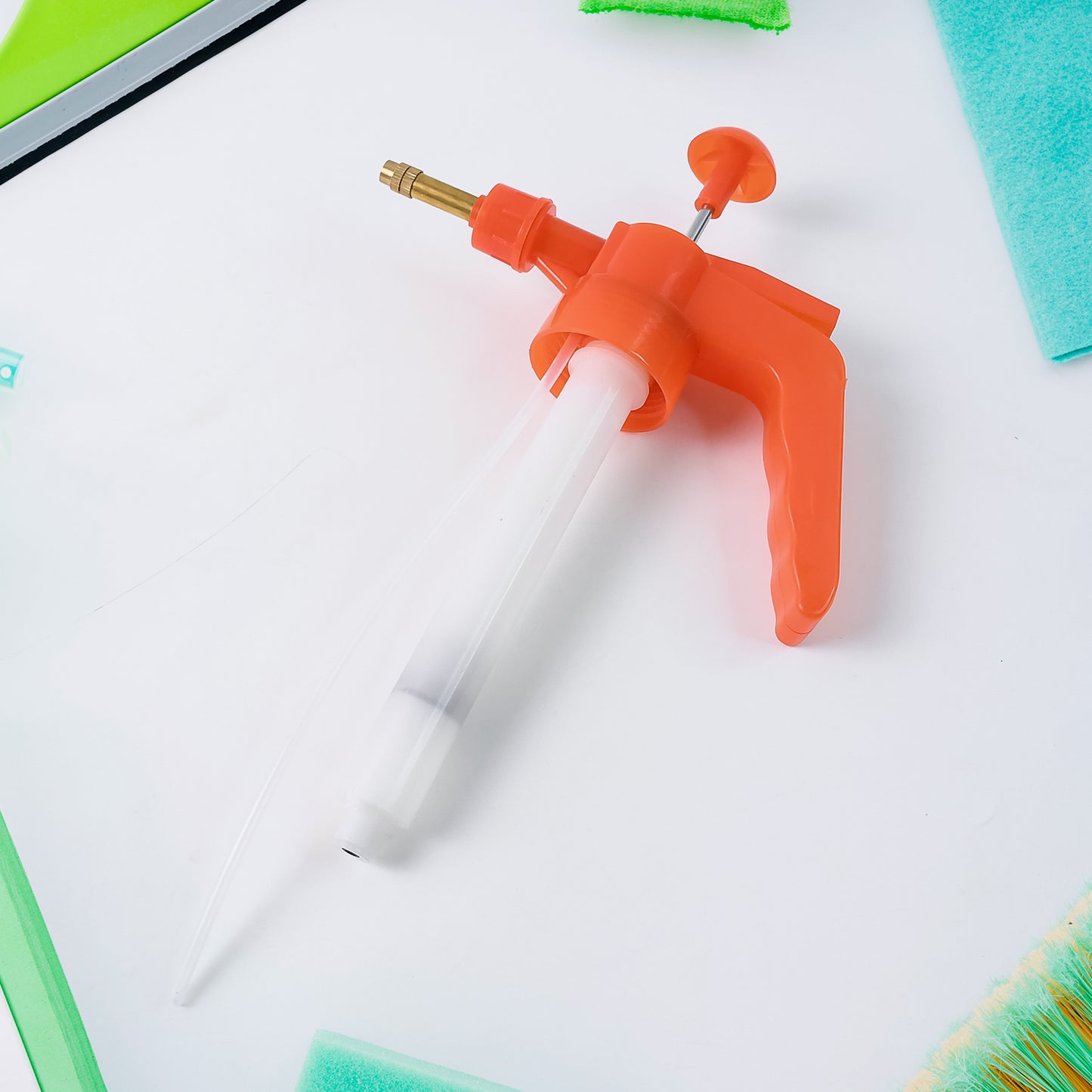 Wukusy 1L handheld pressure garden water sprayer bottle for watering plants and garden tasks.