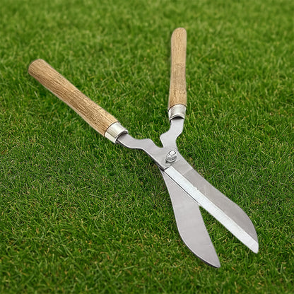 Heavy-duty B grade hedge shear with wooden handle by Wukusy, designed for trimming garden hedges and shrubs.