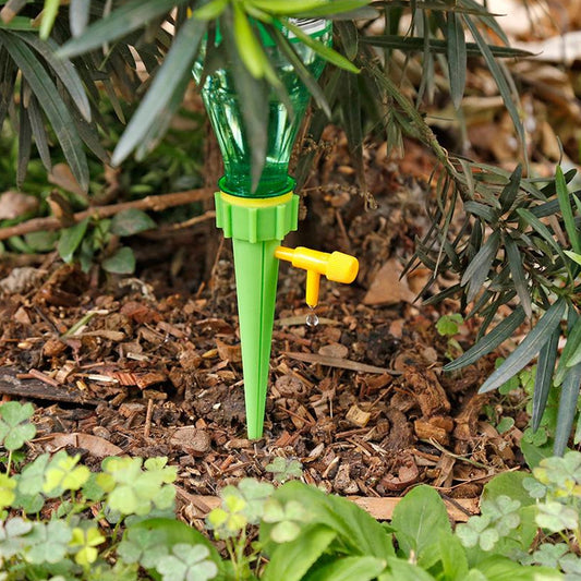 Wukusy garden plant watering spike with adjustable water dripper and slow release valve for automatic plant hydration.