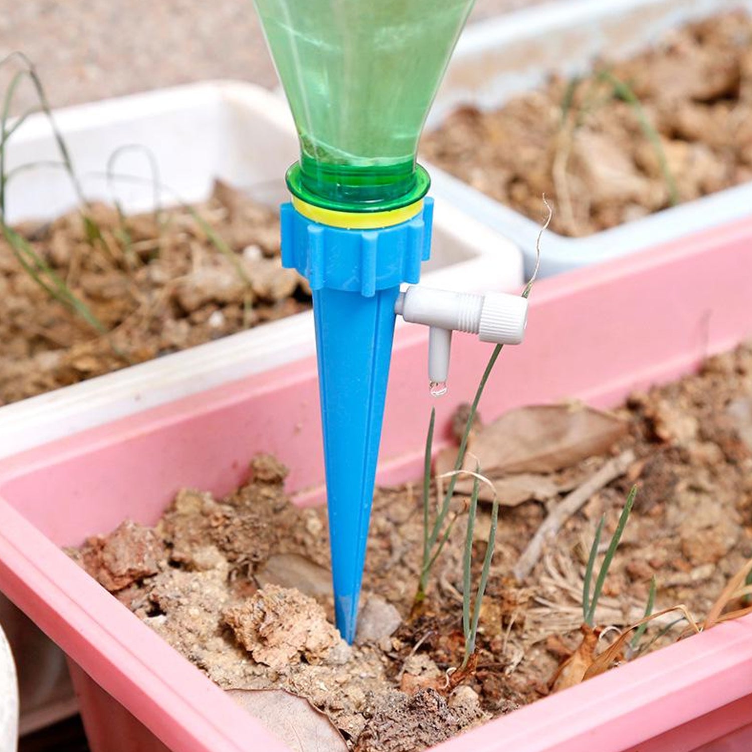 Wukusy garden self-watering plant spikes with adjustable control valve and slow release water dripper for efficient plant watering.