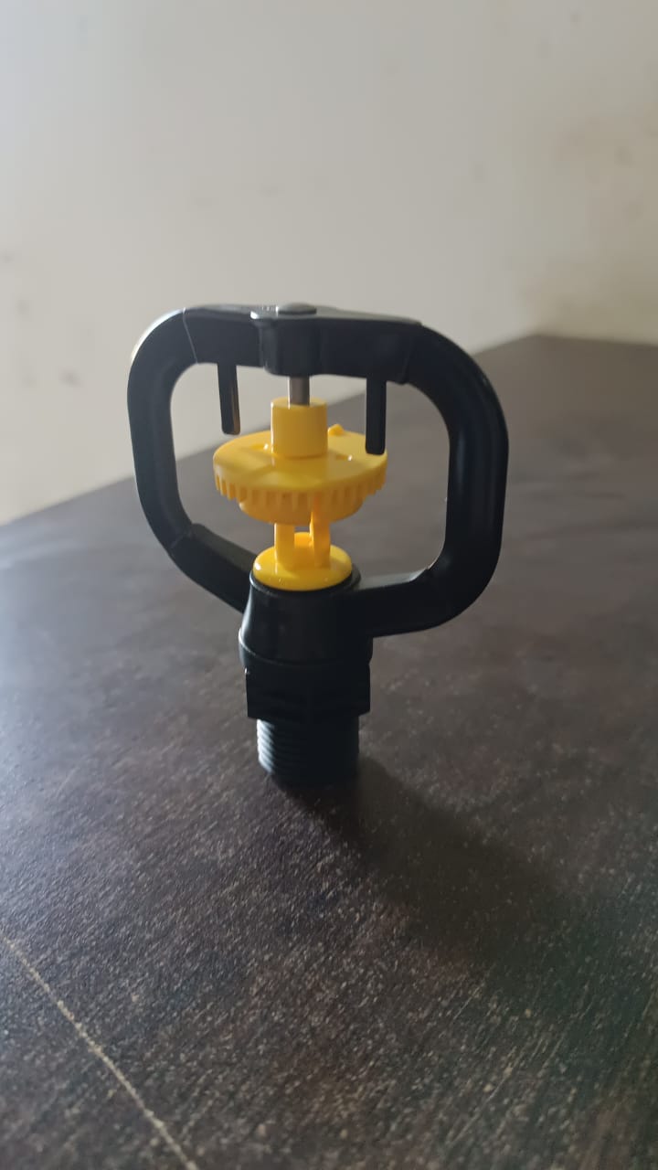 Wukusy garden rotating irrigation sprinkler plastic spray nozzle for efficient watering of lawns and gardens.
