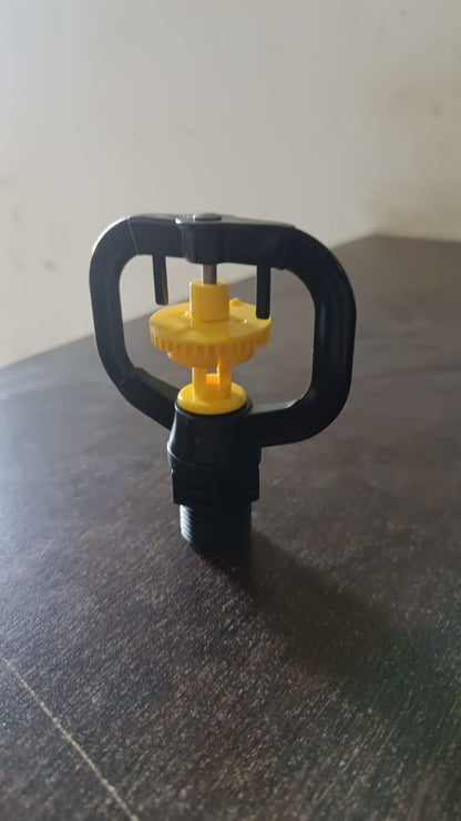 Wukusy garden rotating irrigation sprinkler plastic spray nozzle for efficient watering of lawns and gardens.