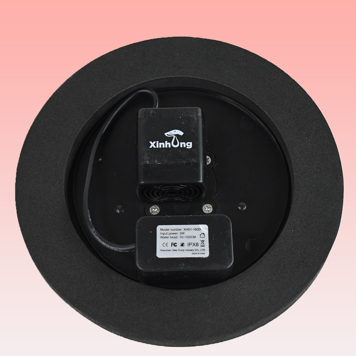 Wukusy solar-powered floating water fountain pump kit for garden ponds, featuring a compact pump with adjustable spray heads.