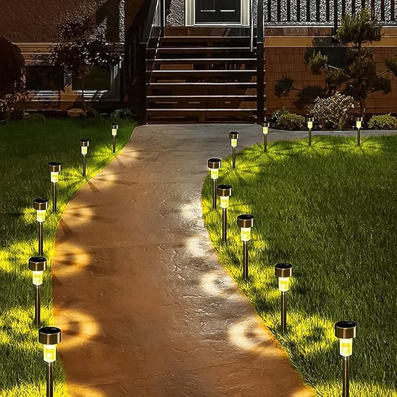Set of two Wukusy solar-powered stainless steel garden pathway lights, 31x4 cm, for outdoor lighting and garden decoration.