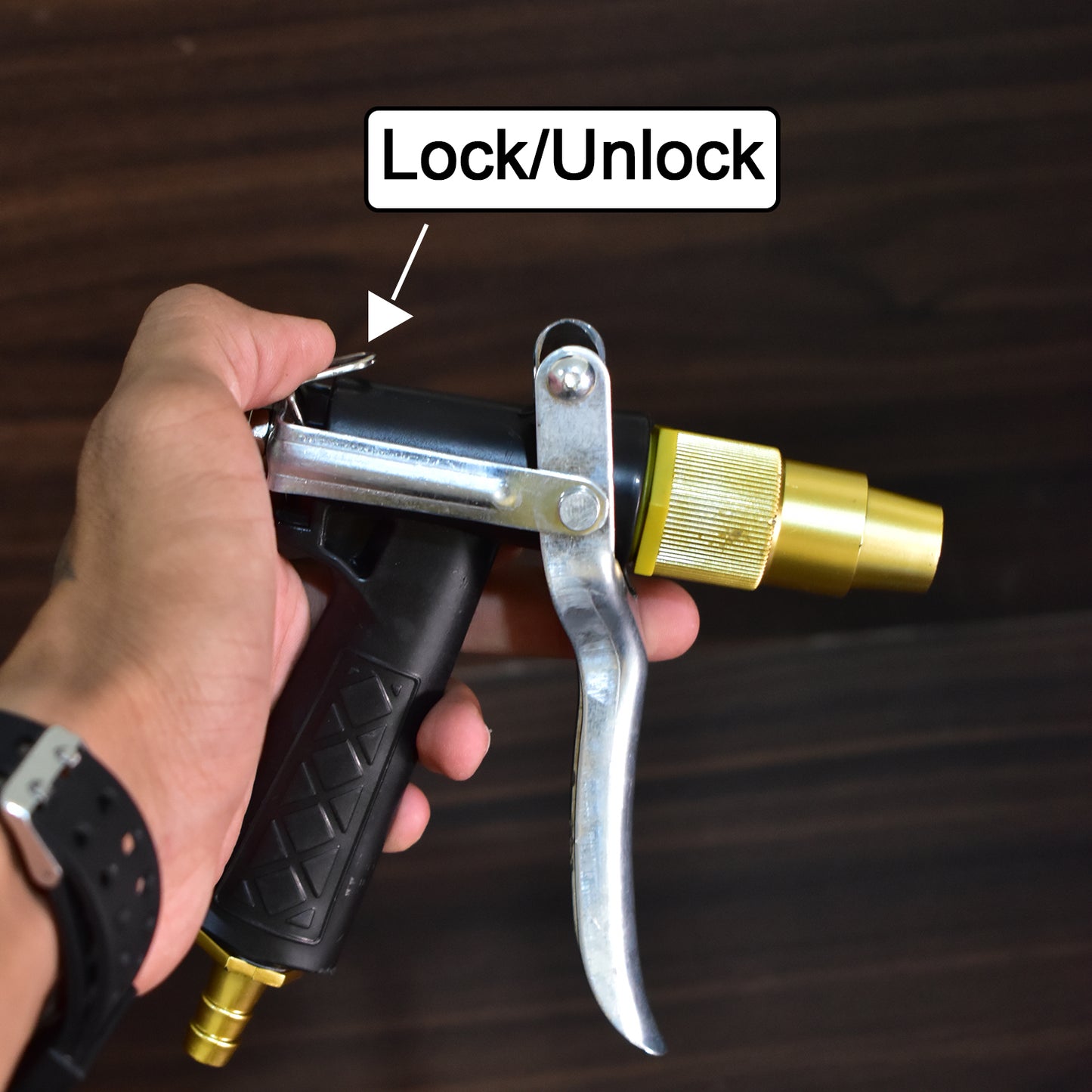 Wukusy gold-plated metal trigger hose nozzle with water lever spray for garden watering and outdoor cleaning tasks.