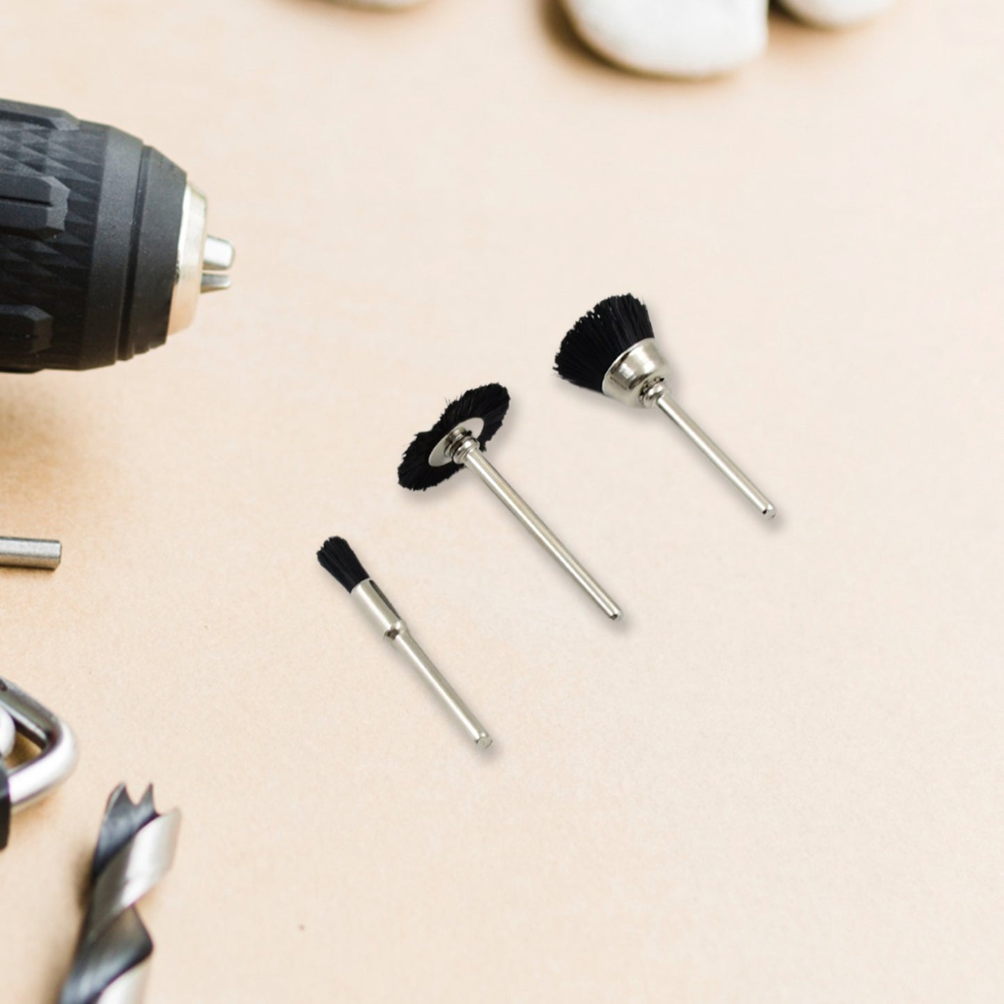 Set of three brass wire wheels from Wukusy for rust removal, hardware tool for cleaning and polishing metal surfaces.