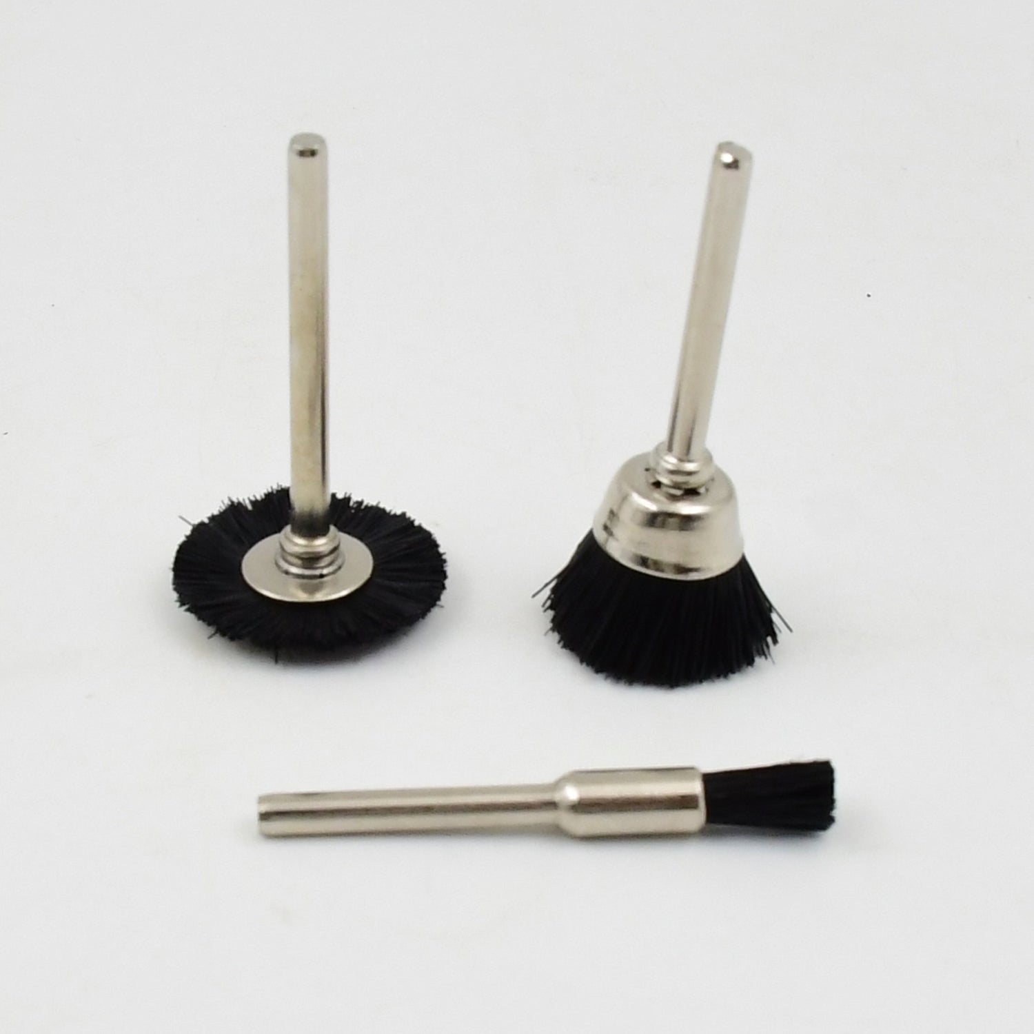 Set of three brass wire wheels for rust removal, Wukusy hardware tool, ideal for cleaning and polishing metal surfaces.