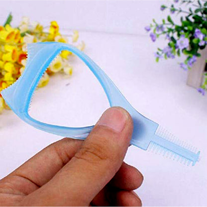 Wukusy 3-in-1 plastic eyelash tool with mascara applicator, eyelash curler, and brush for eye makeup application.