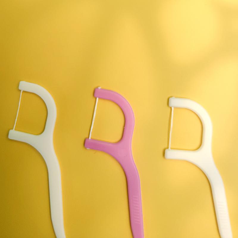 Wukusy 1096 Oral Care Dental Floss Toothpick Sticks for cleaning between teeth and maintaining oral hygiene.