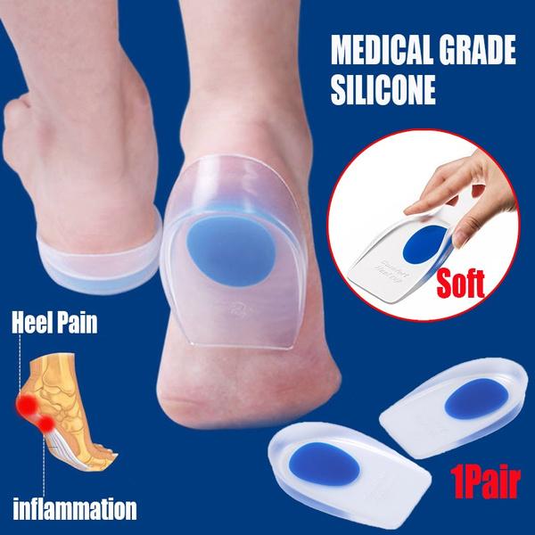 Wukusy Gel Heel Cups, silicone heel pads designed to relieve heel and ankle pain, shown in a close-up image.