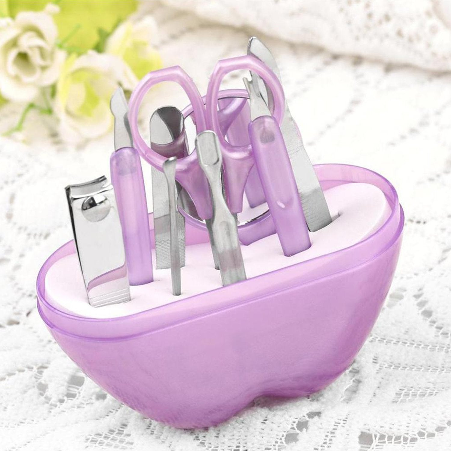 Wukusy 1491 8-in-1 apple-shaped manicure set with various nail tools for grooming and beauty care.