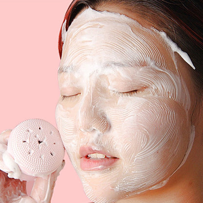 Wukusy facial cleansing brush featuring a cute octopus-shaped silicone face scrubber and skincare massager in a playful design.