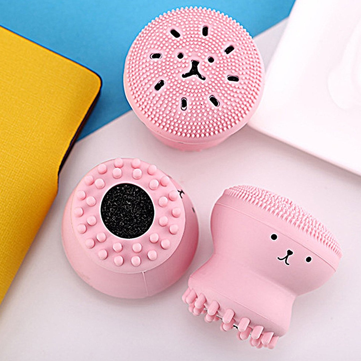 Wukusy facial cleansing brush in cute octopus shape, silicone face scrubber and massager for skincare, one-piece.